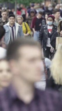Vertical video of a crowd of people