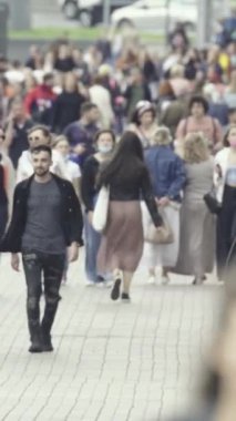 Vertical video of a crowd of people