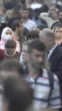 Vertical video of a crowd of people