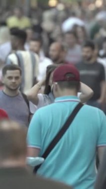Vertical video of a crowd of people