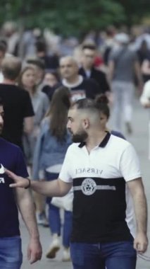 Vertical video of a crowd of people
