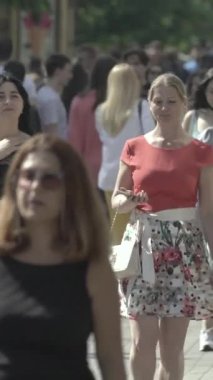 Vertical video of a crowd of people
