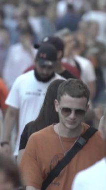 Vertical video of a crowd of people