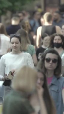 Vertical video of a crowd of people