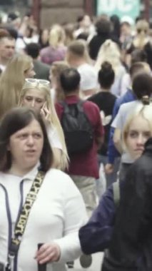 Vertical video of a crowd of people