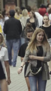 Vertical video of a crowd of people