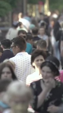 Vertical video of a crowd of people