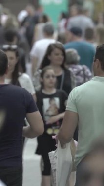 Vertical video of a crowd of people