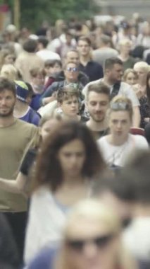 Vertical video of a crowd of people