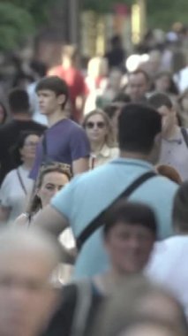 Vertical video of a crowd of people