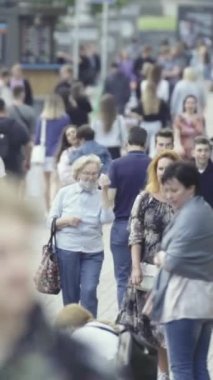 Vertical video of a crowd of people