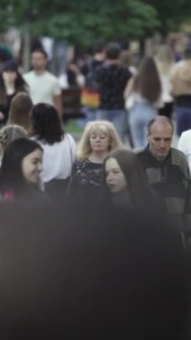 Vertical video of a crowd of people