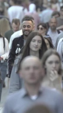 Vertical video of a crowd of people