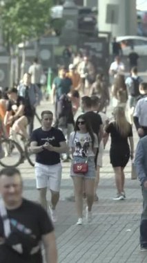 Vertical video of a crowd of people