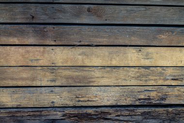 Eski tahtaların arka planında mesaj için yer var. Boşluğu kopyala, üst görünüm, düz uzanma