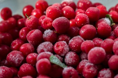 Donmuş kiraz arka planı. Kırmızı böğürtlenli güzel bir arka plan..