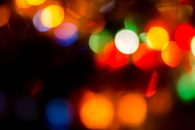 Yeni yıl çelenginden bir parıltı. Noel arkaplanı. İyi Yeni Yıl ruhu.