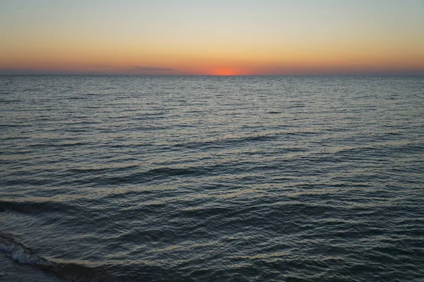 Sun rising over the sea. Dawn over the Sea of Azov.