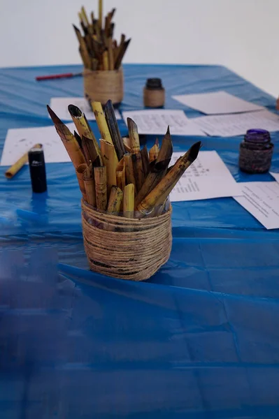 Antique writing utensils made from hollow reeds.