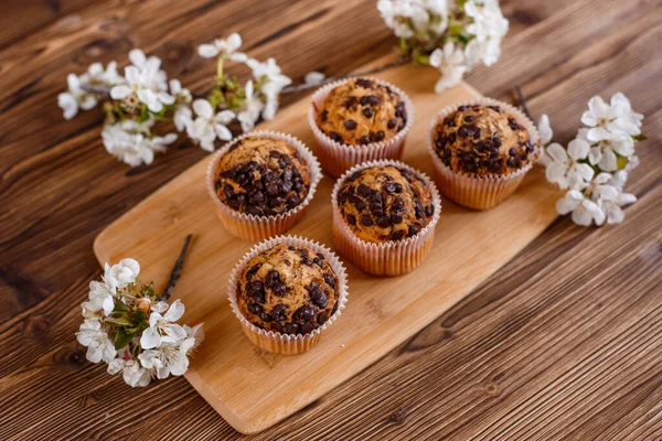 Muffins Chocolate Chips Cup Coffee Wooden Background Blooming Twig — Stock Photo, Image