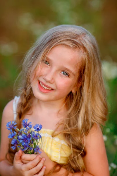 Cute Little Girl Grass Posing Wildflowers —  Fotos de Stock