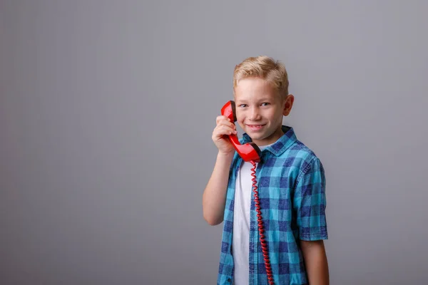 Menino Falando Smartphone Sobre Branco — Fotografia de Stock