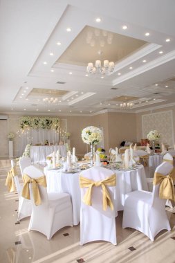 Decorated wedding banquet hall in classic style. Restaurant interior for banquet, wedding deco