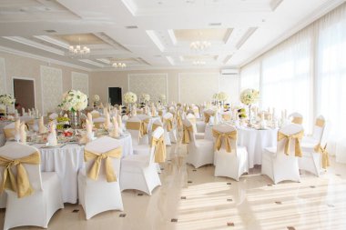 Decorated wedding banquet hall in classic style. Restaurant interior for banquet, wedding deco