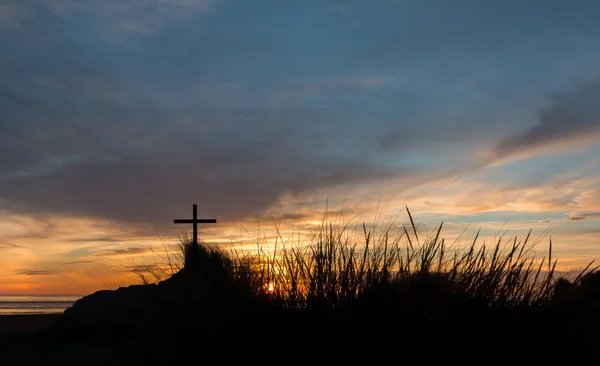 Gräs Cross Sunset Stockfoto