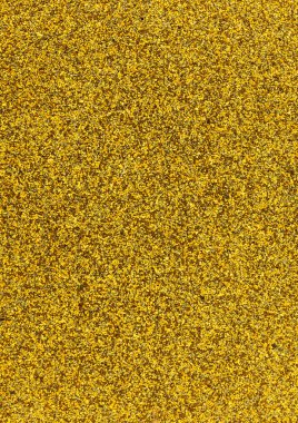 Kauçuk kırıntıları, altın görünümlü arka plan..