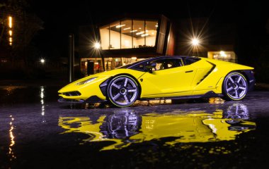 Foxton, Horowhenua, New Zealand 04.07.2019 Yellow Lamborghini Centenario on a dark night. clipart