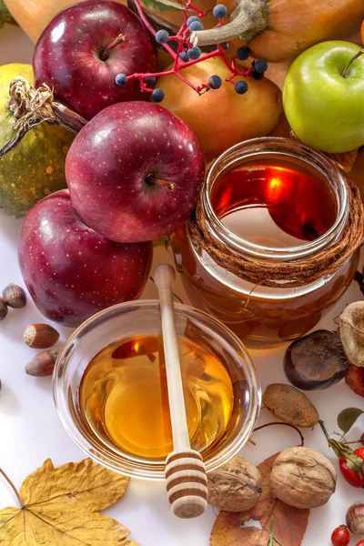 Autumn fruits with honey — Stock Photo, Image