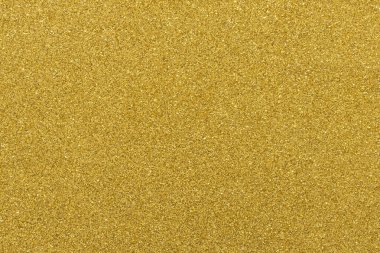 Altın rengi şenlik arka plan, makro, desen yakın plan. Uzayı metin için kopyala. Yatay ya da dikey. Kutlamalar, tatiller, satışlar, moda konsepti, maket için hasat.