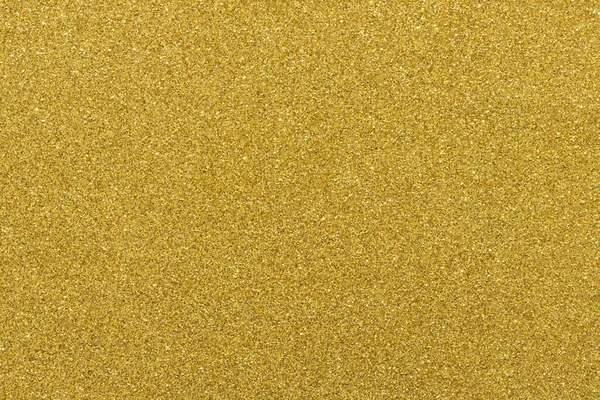 Gold festive background, macro, texture close-up. Copy space for text. Horizontal or vertical. Celebration, holidays, sales, fashion concept, harvesting for mock up.