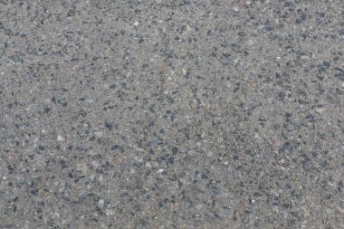 Gri beton - asfalt yüzeyine küçük taşlarla