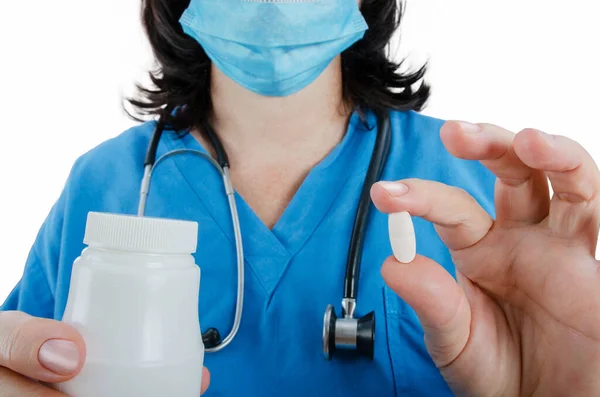 Hand Medical Practitioner Blue Uniform Holds One White Pill Other — Stock Photo, Image