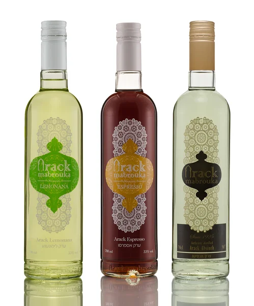 Three bottles of Mabrouka Authentic Arack on white background — Stock Photo, Image