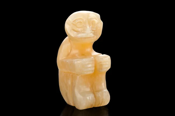 Carved aragonite sitting monkey — Stock Photo, Image