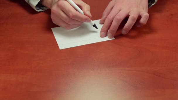 Bir not kağıdına başarı yazma — Stok video