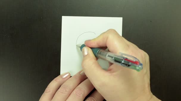 Drawing smiley face Confused on note paper — Stock Video