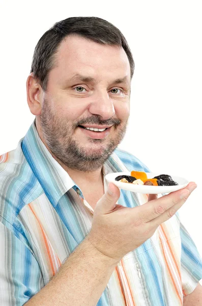 Guy promoting dried fruits diet — Stock Photo, Image