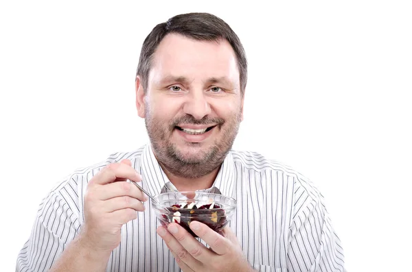 Smiling guy is fond of a beet salad — Zdjęcie stockowe