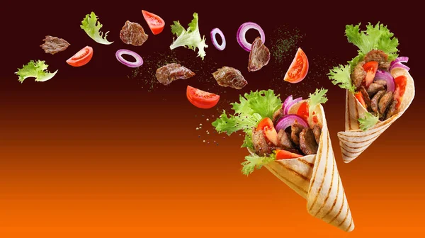 Due Doner Kebab Shawarma Con Ingredienti Galleggianti Nell Aria Carne — Foto Stock