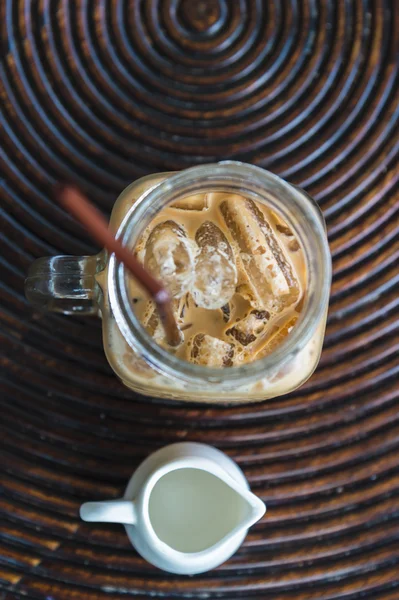 Top view of ice coffee on wooden table — Stock Photo, Image