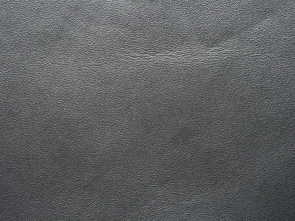 Oberfläche aus dunklem, echtem Leder — Stockfoto
