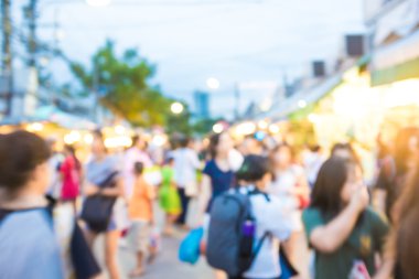 Bulanık soyut insanlar sokakta, Chatuchak hafta sonu pazarında.