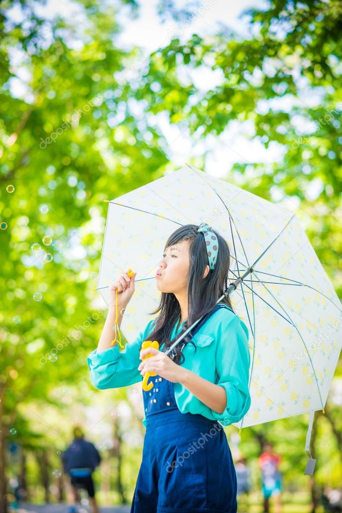 Outdoor bubble asian young