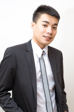 Genç iyi akıllı görünümlü Asya profesyonel iş adamı