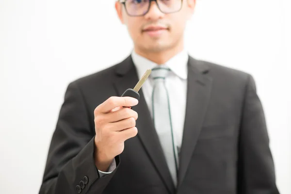 Asian Man Black Suit Standing White Background Giving Car Key — Stock Photo, Image