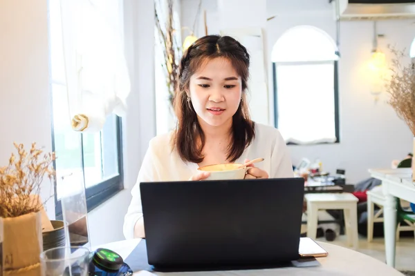 Top view ofman working on laptop and having cup of coffee — Stock Photo, Image